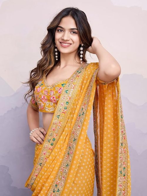 Fancy saree party wear in yellow georgette with embroidery
